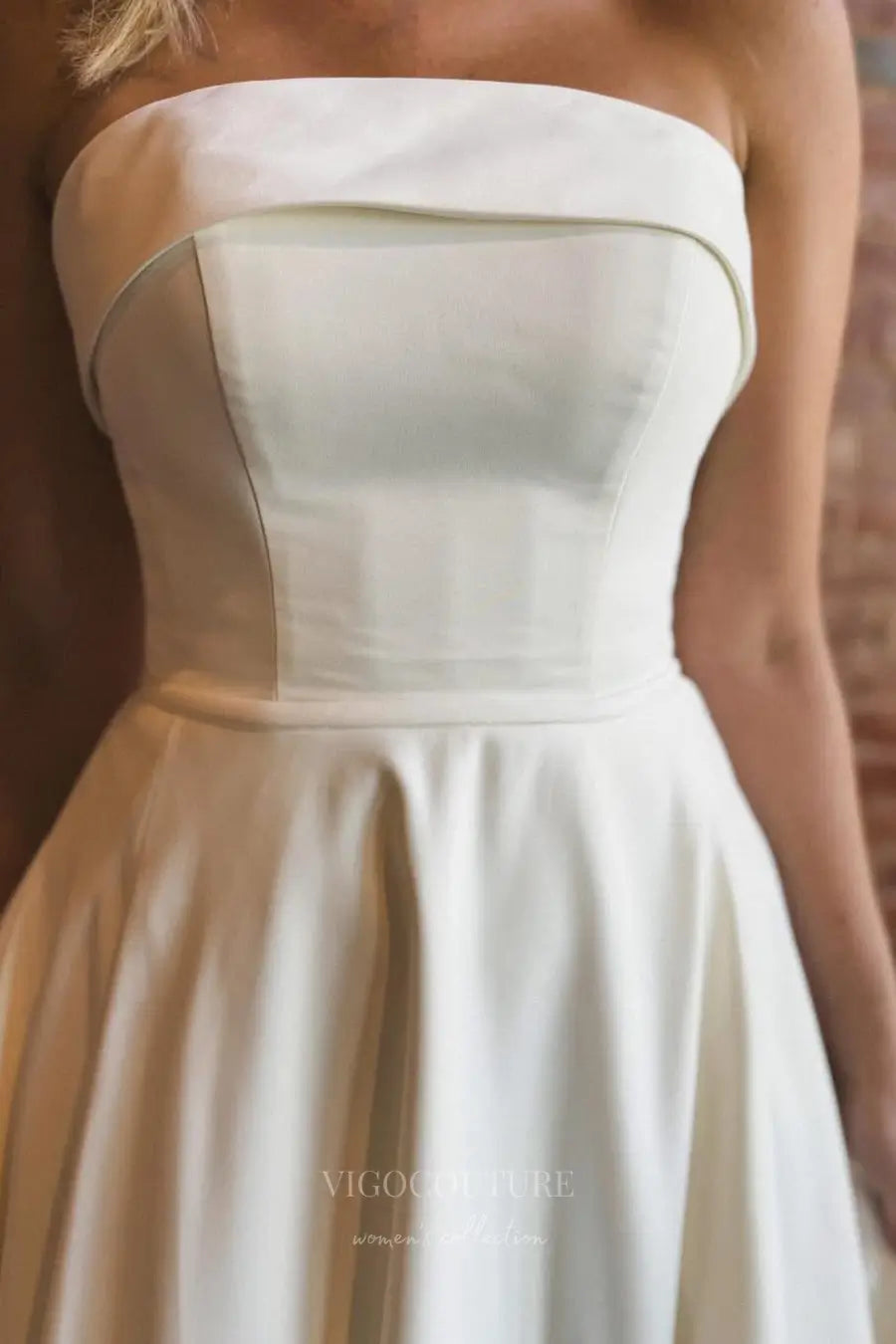 Wedding Dresses 2025 to impress Elegant Strapless Satin A-Line Wedding Dress with Fold-Over Neckline, Pockets & Button-Back Train – W2612-vigocouture-vigocouture