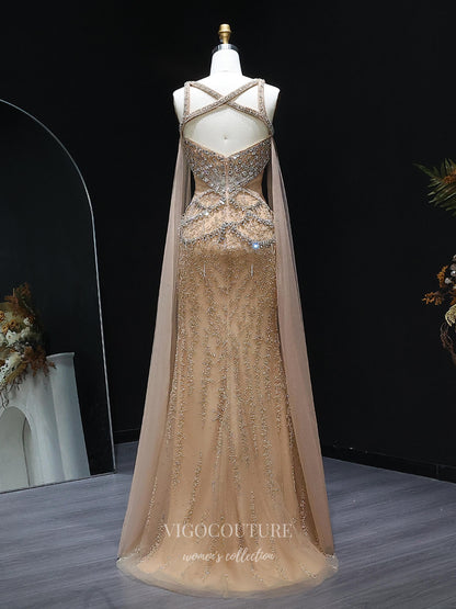 Evening Gown 2025 to impress Champagne Beaded Sheath Evening Gown with Illusion Crisscross Neckline, Open Back & Cape Panels – 26038-vigocouture-vigocouture