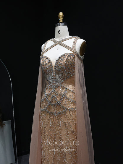Evening Gown 2025 to impress Champagne Beaded Sheath Evening Gown with Illusion Crisscross Neckline, Open Back & Cape Panels – 26038-vigocouture-vigocouture