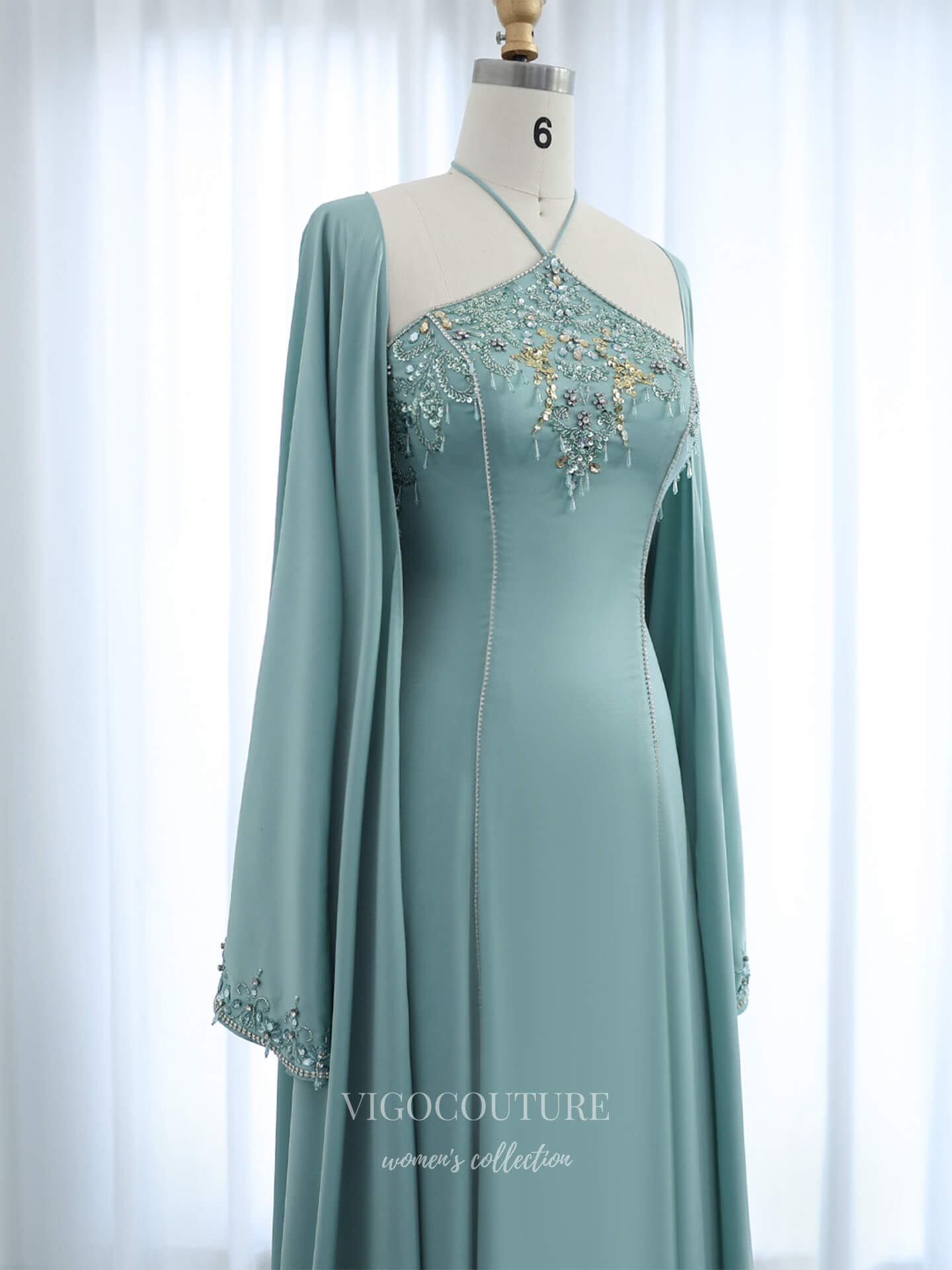 Evening Gown 2025 to impress Mint Green Beaded Halter Neck Sheath Evening Gown with Cape Sleeves & Embroidered Bodice – 26026-vigocouture-vigocouture