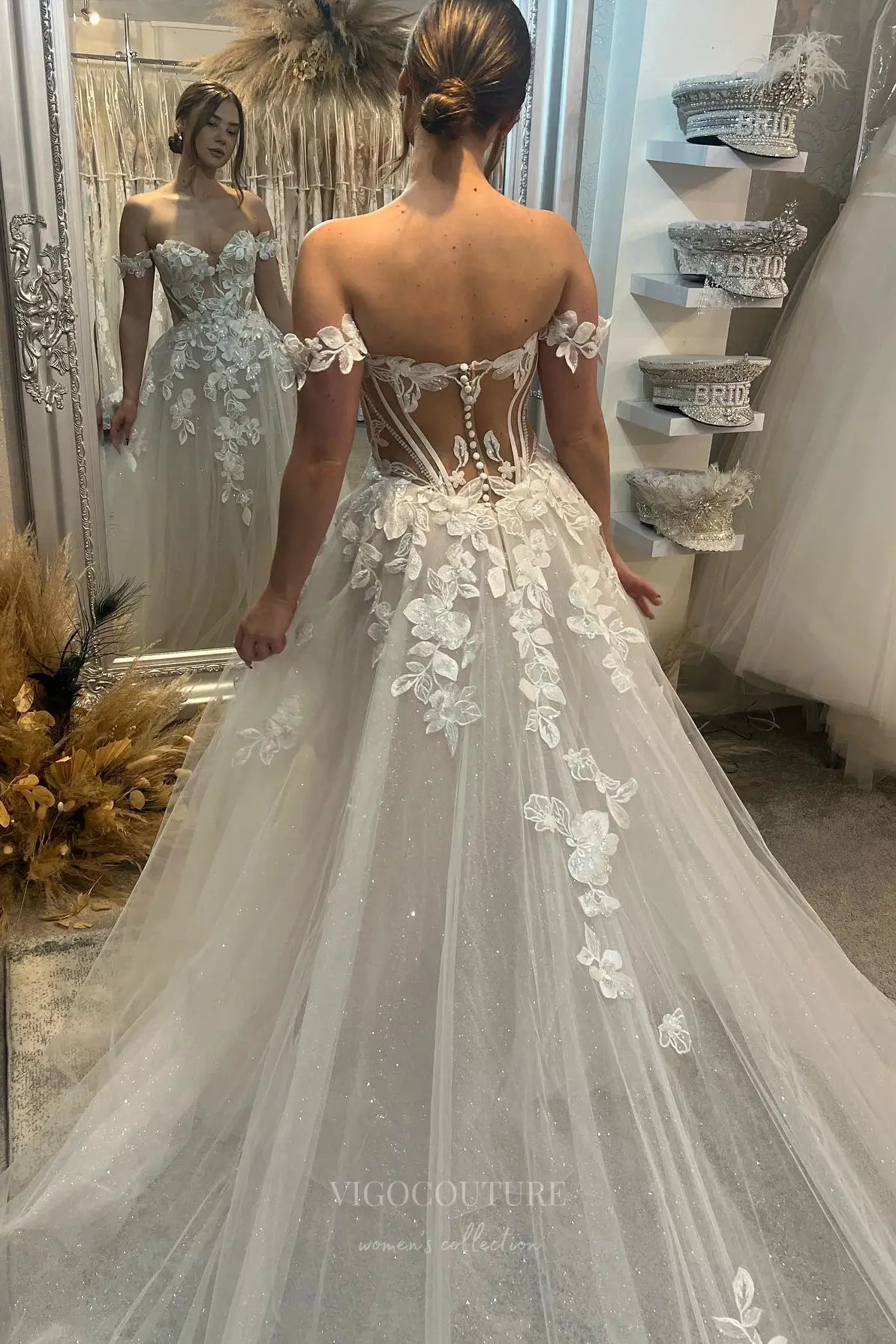 Wedding Dresses 2025 to impress Ivory Off-Shoulder Floral Appliqué A-Line Wedding Dress with Sheer Corset Bodice and Sparkle Tulle Train – W2244-vigocouture-vigocouture