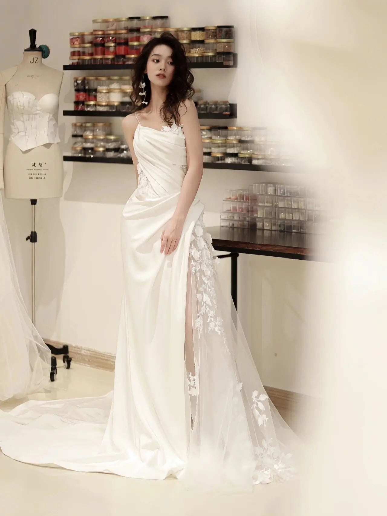 Asymmetrical Draped Wedding Gown with Sheer Lace Corset and Floral Tulle Overlay Style RD008 Ivory / 4 Asymmetrical Draped Wedding Gown with Sheer Lace Corset and Floral Tulle Overlay Style RD008 Ivory / 4