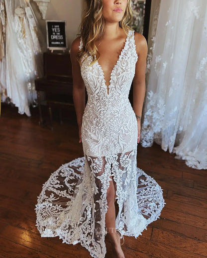 Chic Ivory Lace Mermaid Wedding Dress with Deep V-Neck, Sheer Skirt, Front Slit & Scalloped Train – W2639