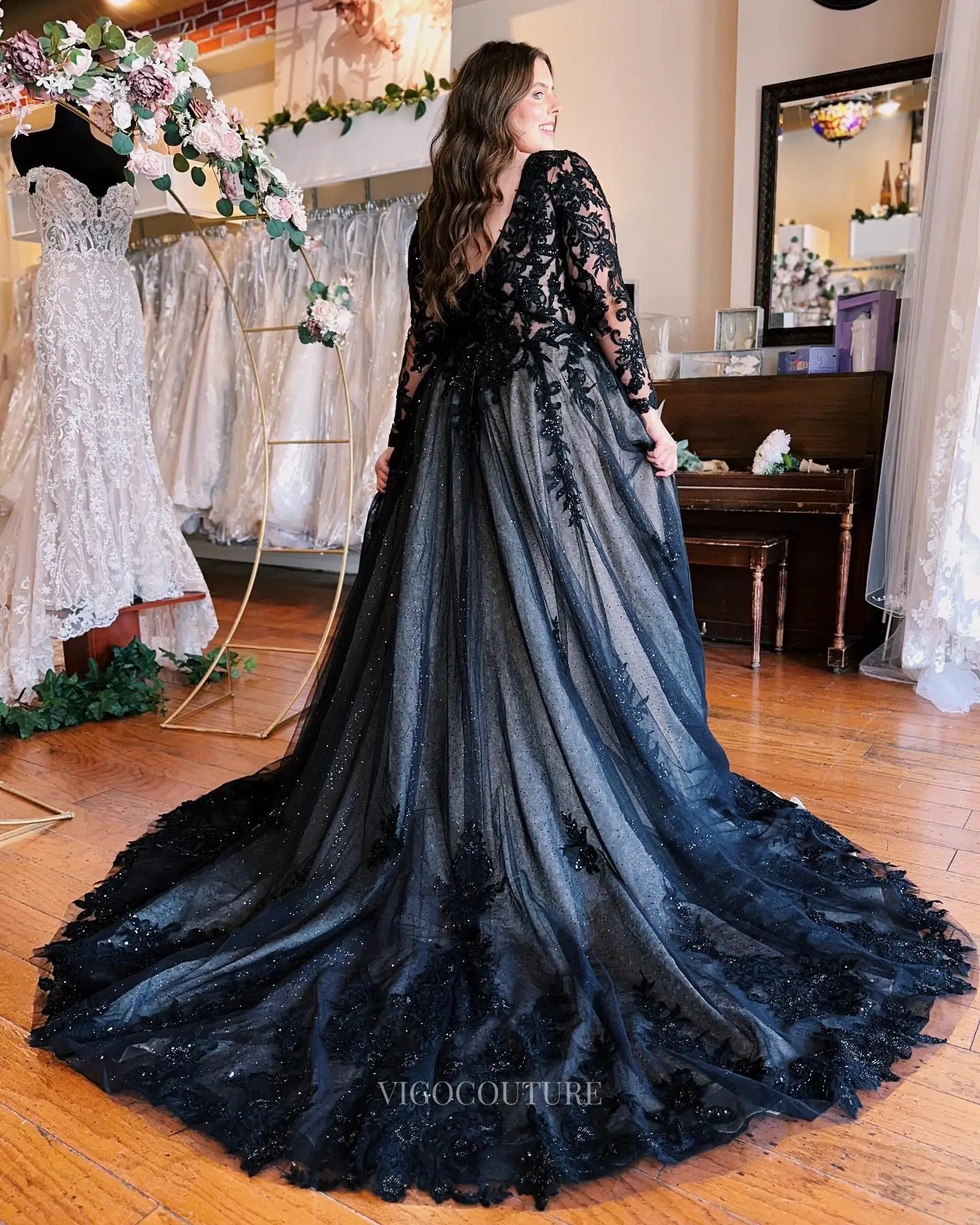 Wedding Dresses 2025 to impress Dramatic Black Lace A-Line Wedding Dress with Sheer Bodice, Long Sleeves & High Slit – W2641-vigocouture-vigocouture