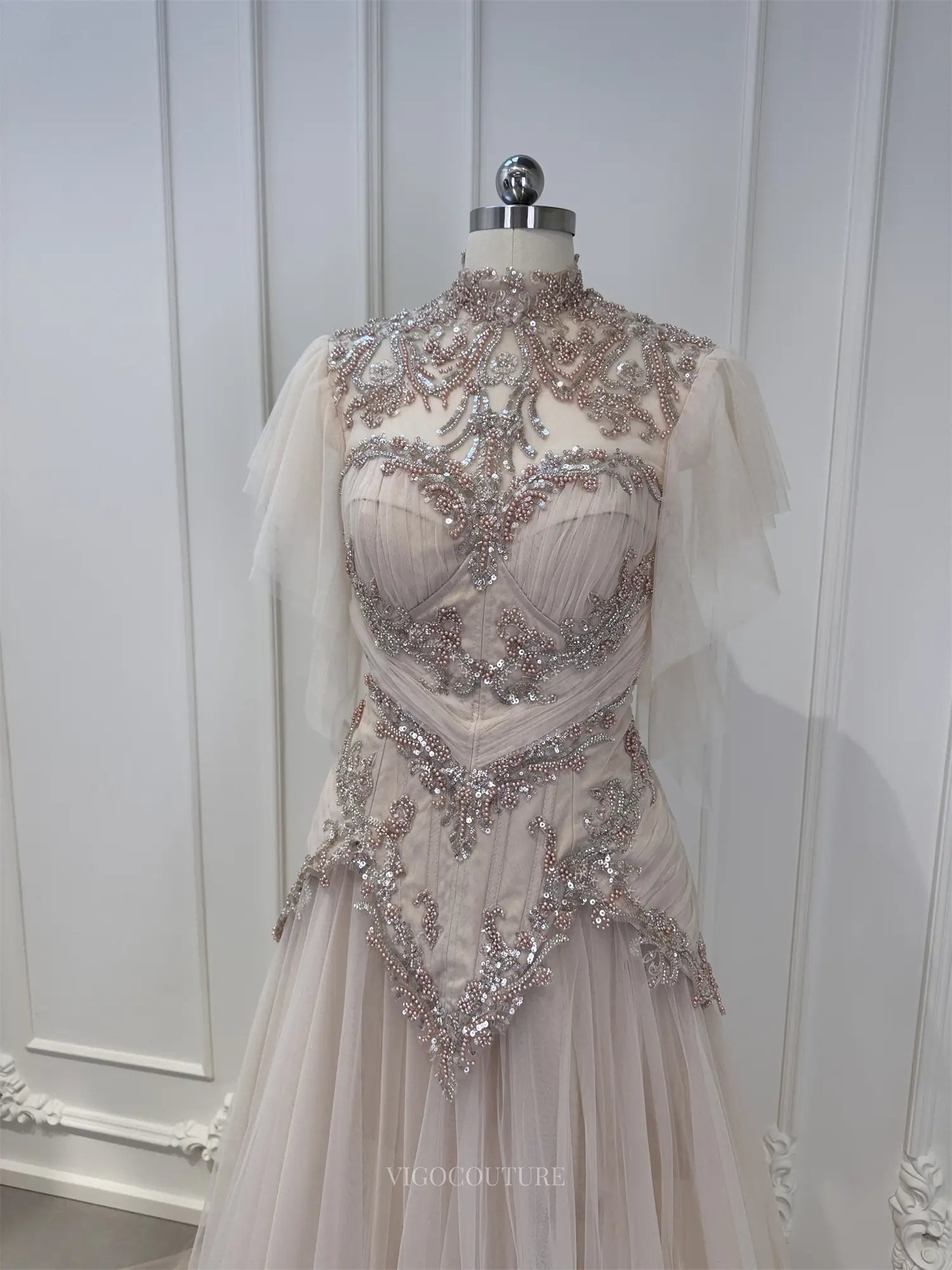 champagne beaded wedding dress Champagne Beaded Long Sleeve Bridal Gown