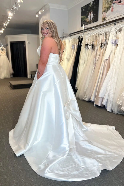 Wedding Dresses 2025 to impress Elegant Ivory Satin Strapless Wedding Dress with Draped Neckline, Pockets & Back Bow – VW2592-vigocouture-vigocouture
