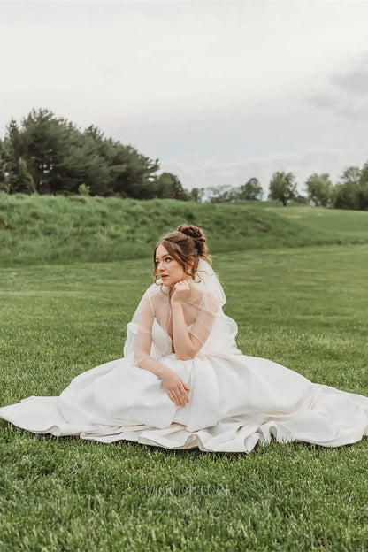 Wedding Dresses 2025 to impress Elegant Satin A-Line Wedding Dress with Spaghetti Straps, Plunging Neckline, Bow Back & Pockets – W2615-vigocouture-vigocouture