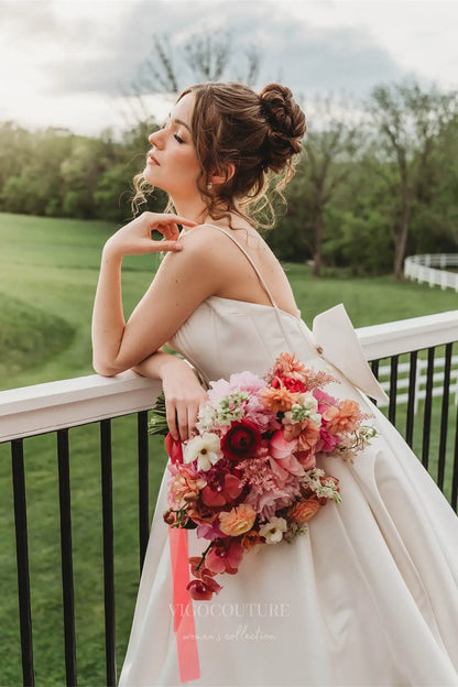 Wedding Dresses 2025 to impress Elegant Satin A-Line Wedding Dress with Spaghetti Straps, Plunging Neckline, Bow Back & Pockets – W2615-vigocouture-vigocouture