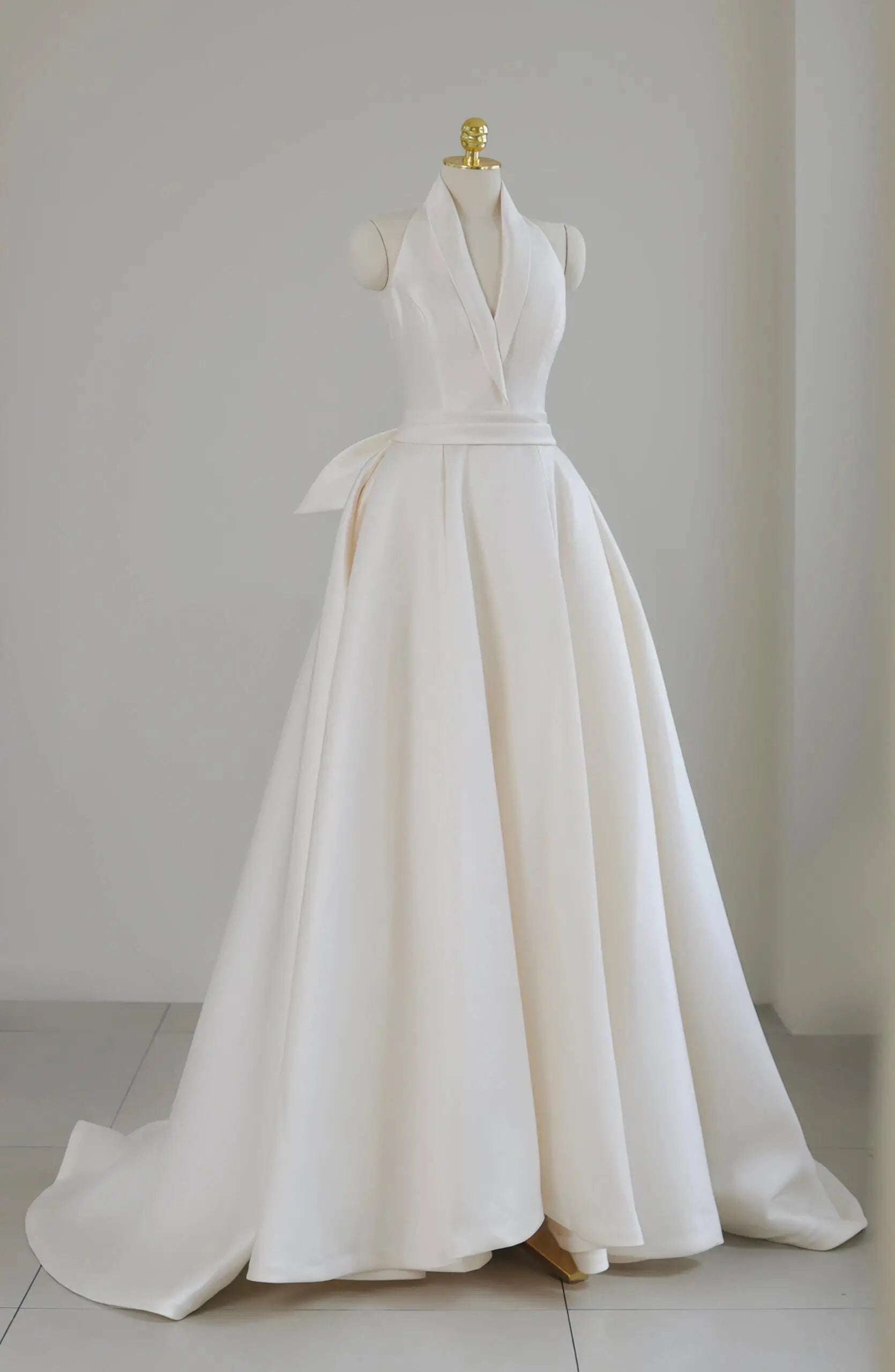 Elegant Satin Halter Wedding Gown with Full Overskirt and Bow Back Detail Style RD004 Ivory / 16W Elegant Satin Halter Wedding Gown with Full Overskirt and Bow Back Detail Style RD004 Ivory / 16W