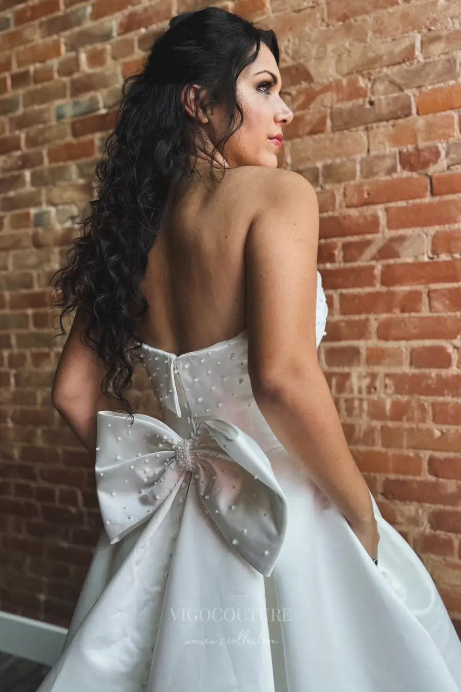 Wedding Dresses 2025 to impress Elegant Satin Strapless Wedding Dress with Pearl Embellished Neckline, Bow Back, Pockets and Button Train – W2362-vigocouture-vigocouture