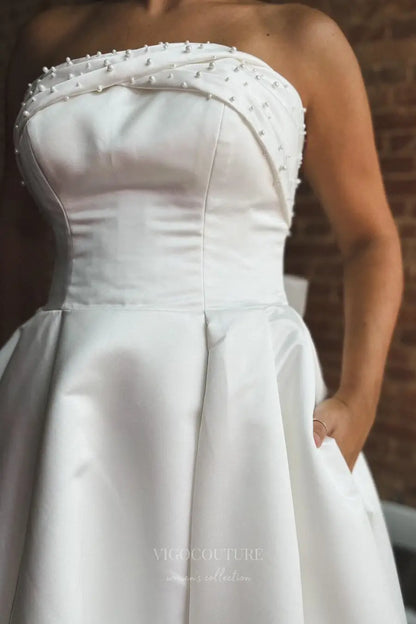 Wedding Dresses 2025 to impress Elegant Satin Strapless Wedding Dress with Pearl Embellished Neckline, Bow Back, Pockets and Button Train – W2362-vigocouture-vigocouture