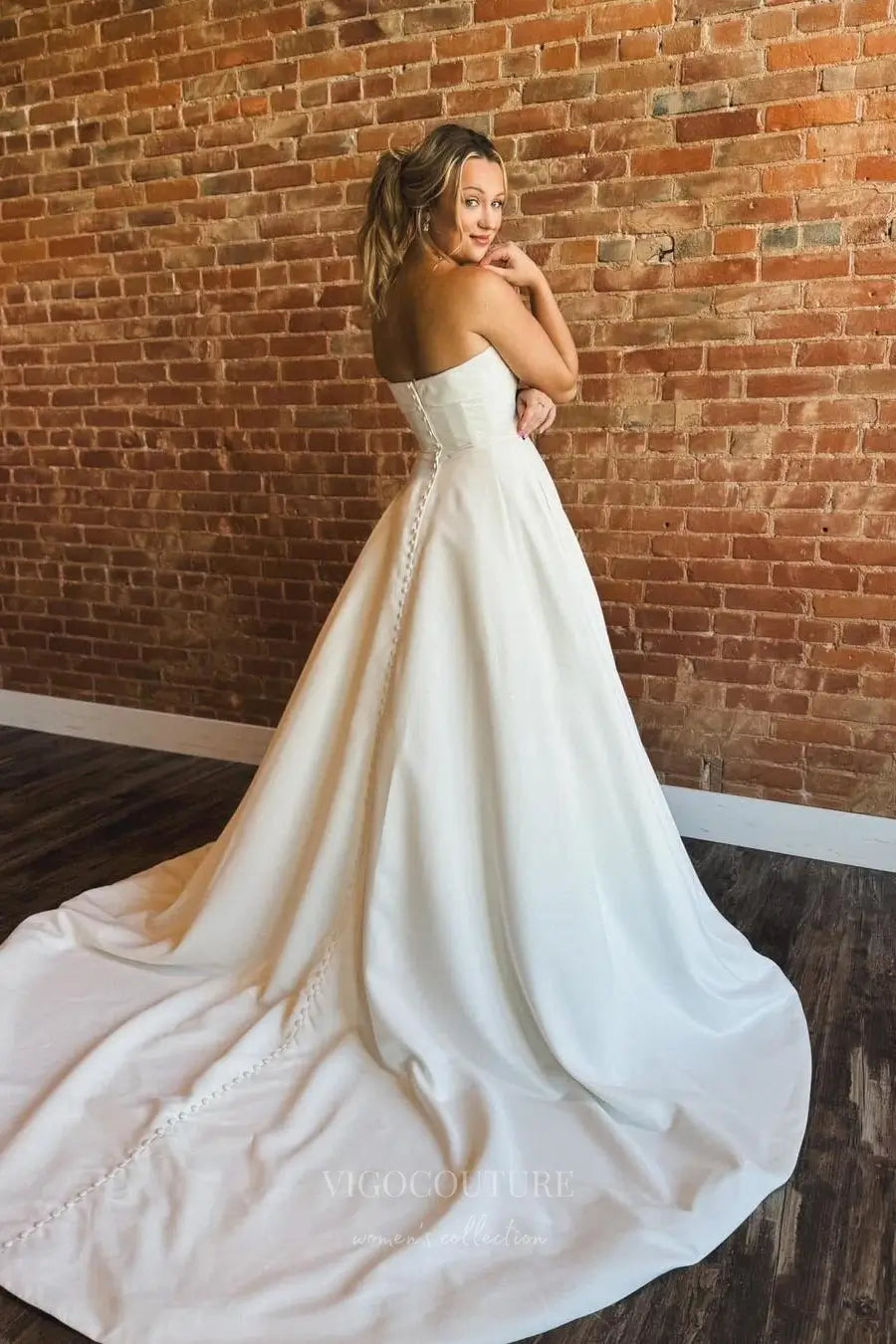 Wedding Dresses 2025 to impress Elegant Strapless Satin A-Line Wedding Dress with Fold-Over Neckline, Pockets & Button-Back Train – W2612-vigocouture-vigocouture