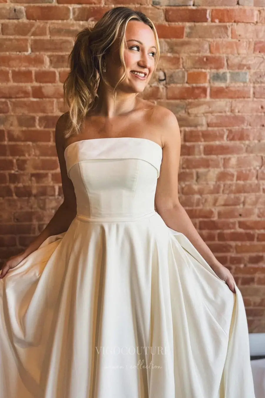 Wedding Dresses 2025 to impress Elegant Strapless Satin A-Line Wedding Dress with Fold-Over Neckline, Pockets & Button-Back Train – W2612-vigocouture-vigocouture