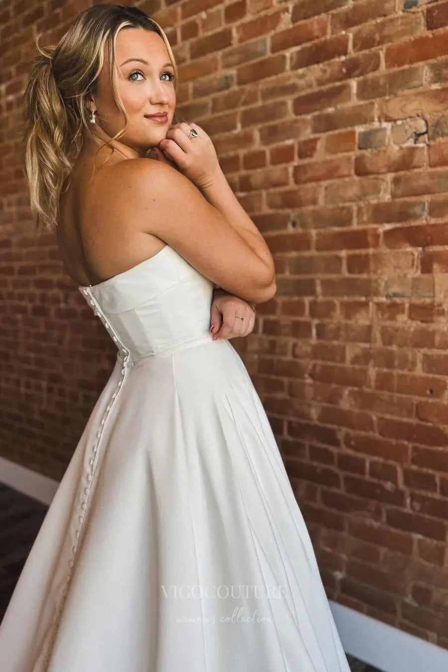 Wedding Dresses 2025 to impress Elegant Strapless Satin A-Line Wedding Dress with Fold-Over Neckline, Pockets & Button-Back Train – W2612-vigocouture-vigocouture