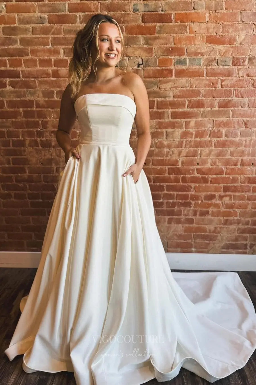 Elegant Strapless Satin A-Line Wedding Dress with Fold-Over Neckline, Pockets & Button-Back Train – W2612