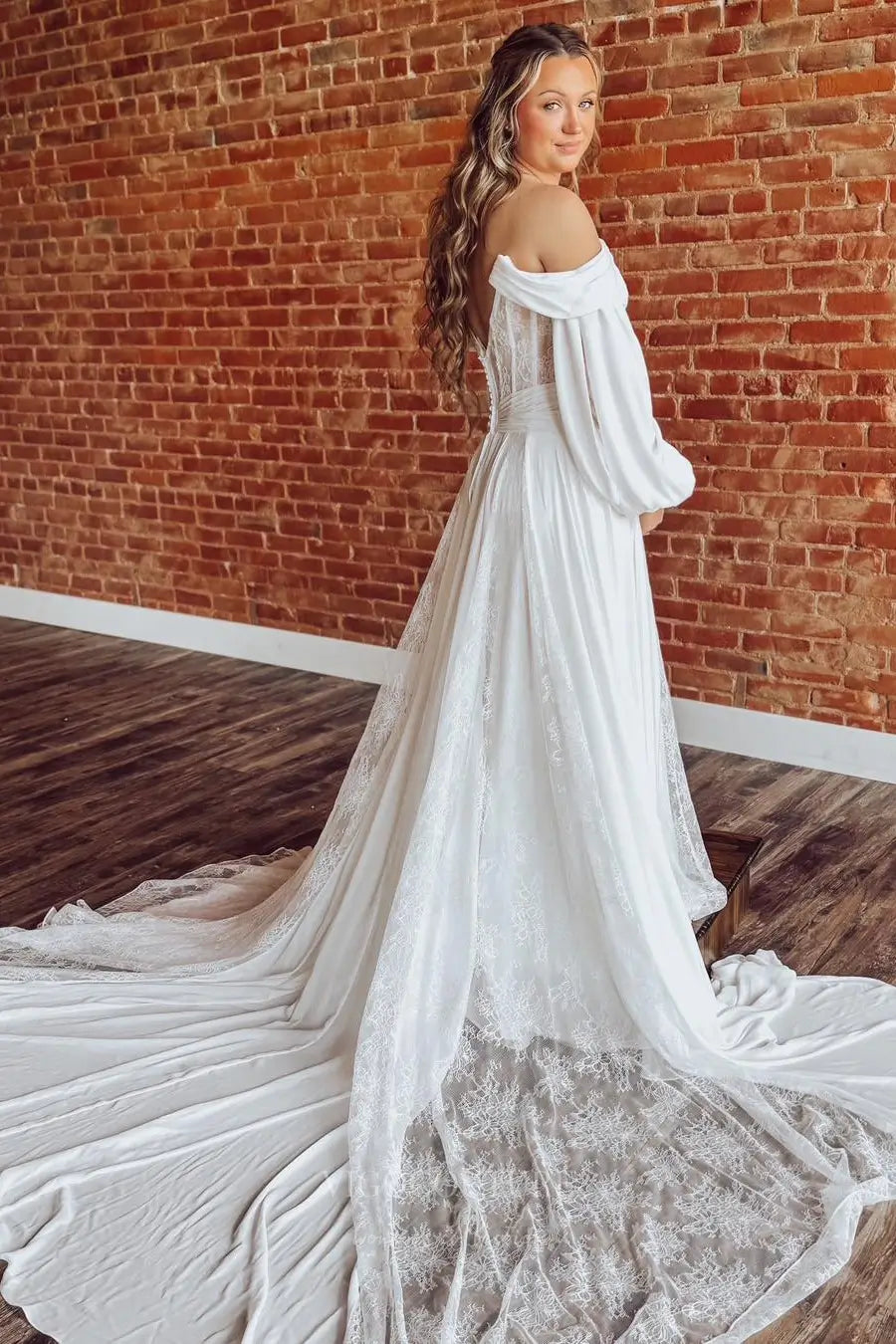 Wedding Dresses 2025 to impress Ivory Off-Shoulder Boho Lace Wedding Dress with Long Bishop Sleeves, Pleated Bodice, Slit & Chapel Train – W2260-vigocouture-vigocouture