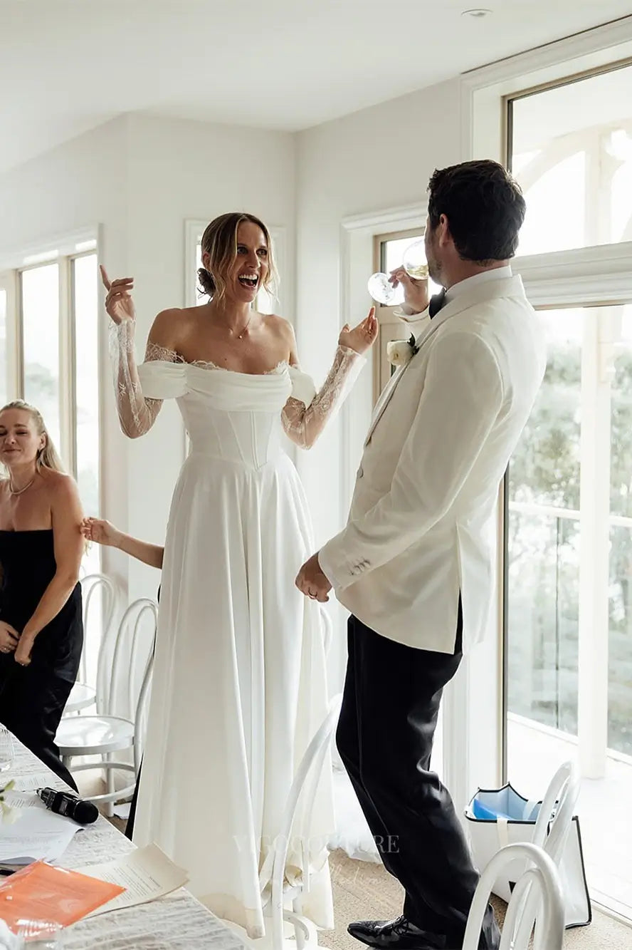 Wedding Dresses 2025 to impress Ivory Off-Shoulder Crepe A-Line Wedding Dress with Lace Sleeves, Corset Bodice & Slit – W2297-vigocouture-vigocouture