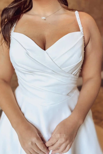 Wedding Dresses 2025 to impress Ivory Satin A-Line Wedding Dress with Pleated Bodice, Beaded Straps, Basque Waist, Illusion Button Back & Pockets – W2621-vigocouture-vigocouture