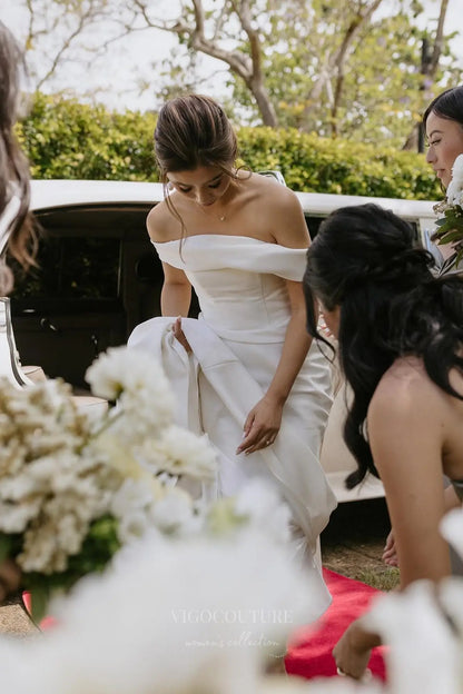 Ivory Satin Off-Shoulder Wedding Dress with Oversized Bow Back, Straight Neckline & Sweep Train – W2299