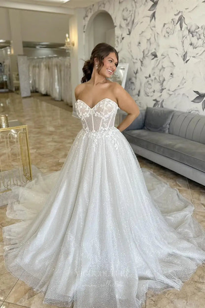 Wedding Dresses 2025 to impress Ivory Sparkle Tulle A-Line Wedding Dress with Sweetheart Neckline, Sheer Corset Bodice, Detachable Bow Sleeves, Chapel Train – W2252-vigocouture-vigocouture