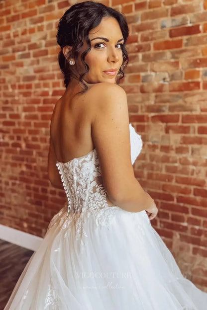 Wedding Dresses 2025 to impress Ivory Strapless Ruffle Tulle Wedding Dress with Lace Appliqué Bodice, Sheer Cutout, High Slit & Chapel Train – W2253-vigocouture-vigocouture