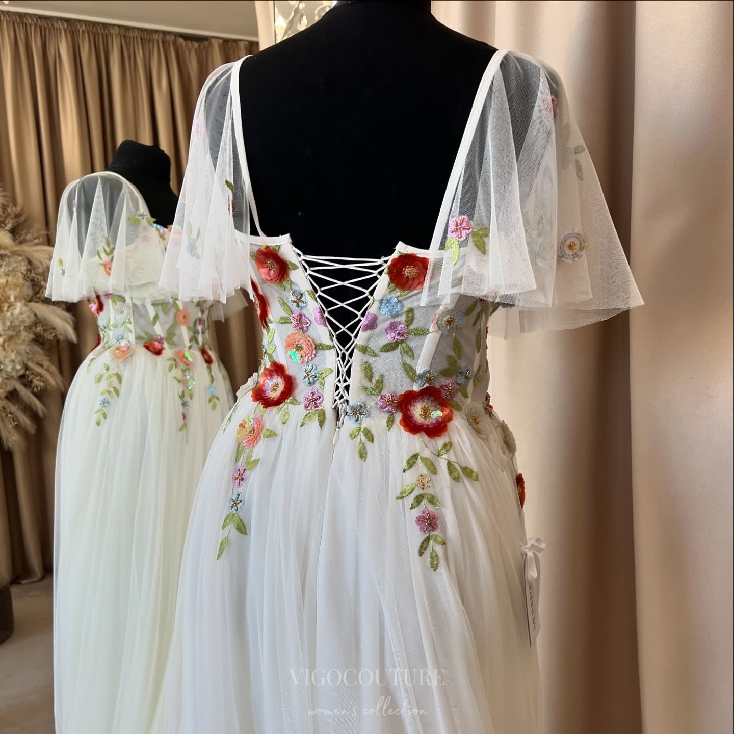 Wedding Dresses 2025 to impress Ivory Wildflower Wedding Dress with Flutter Sleeves, 3D Petal Appliqués, Sheer Corset Bodice, Slit – W2370-vigocouture-vigocouture