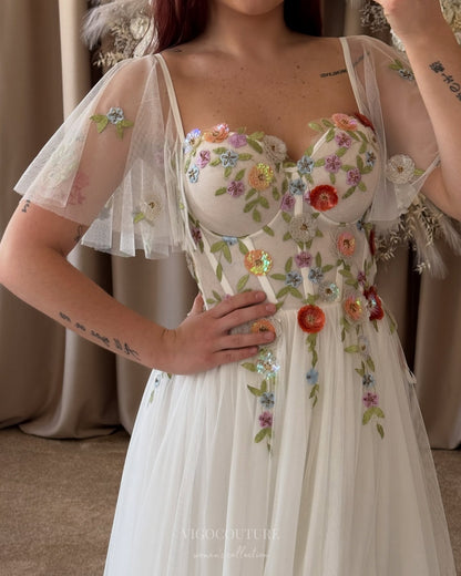 Wedding Dresses 2025 to impress Ivory Wildflower Wedding Dress with Flutter Sleeves, 3D Petal Appliqués, Sheer Corset Bodice, Slit – W2370-vigocouture-vigocouture