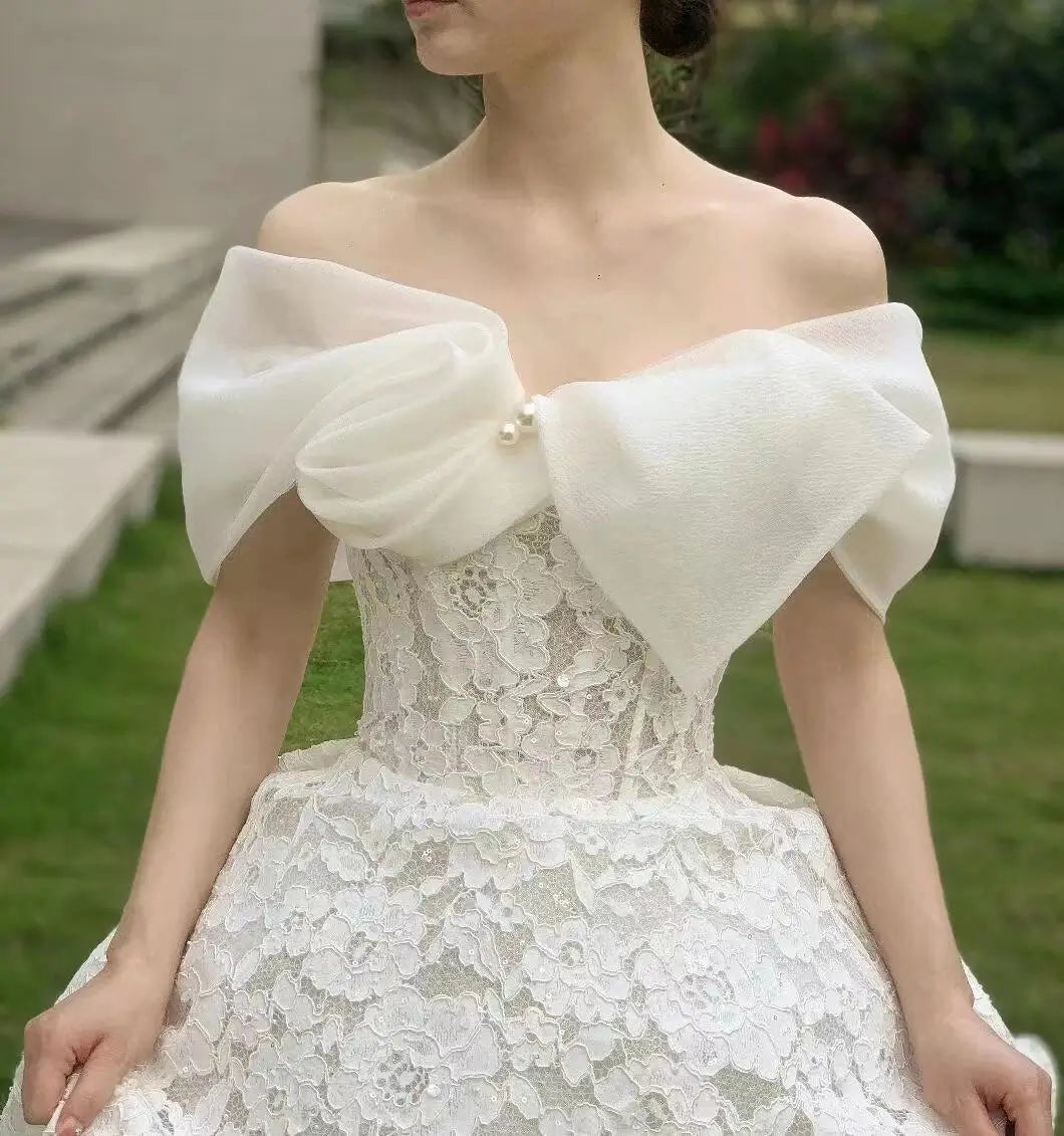 Wedding Dresses 2025 to impress Lace Ball Gown Wedding Dress with Oversized Organza Bow and Off-Shoulder Neckline – RD019-vigocouture-vigocouture