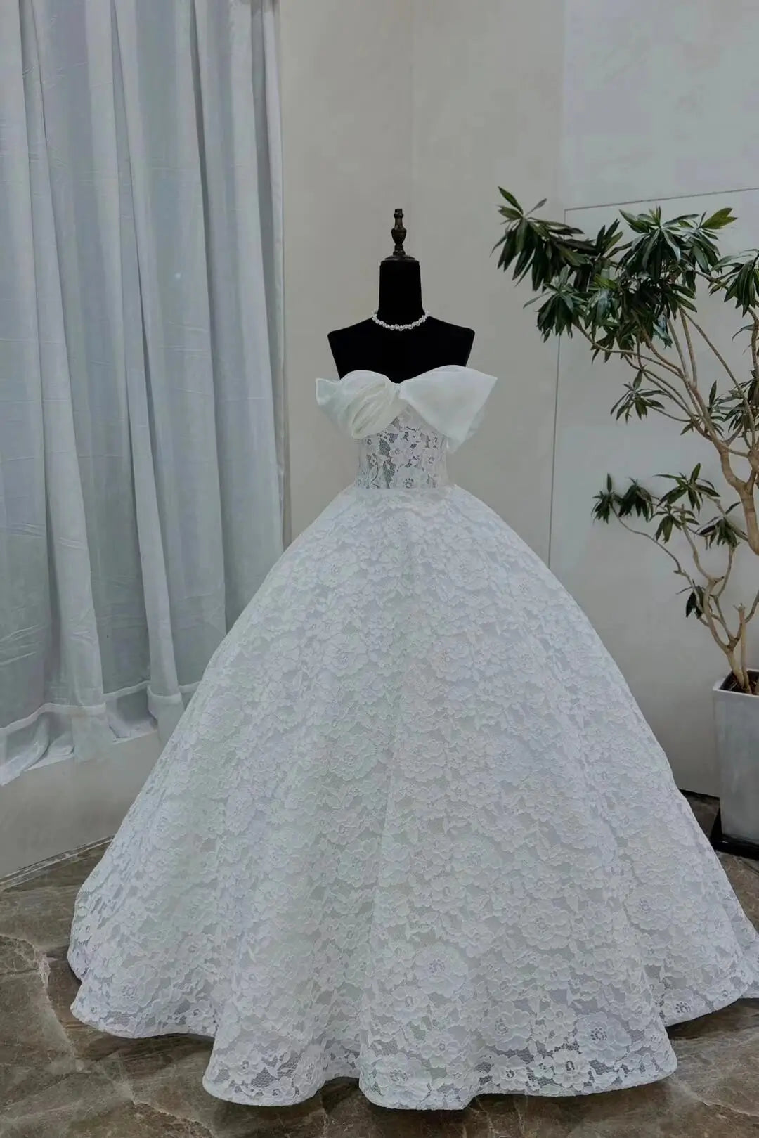 Wedding Dresses 2025 to impress Lace Ball Gown Wedding Dress with Oversized Organza Bow and Off-Shoulder Neckline – RD019-vigocouture-vigocouture