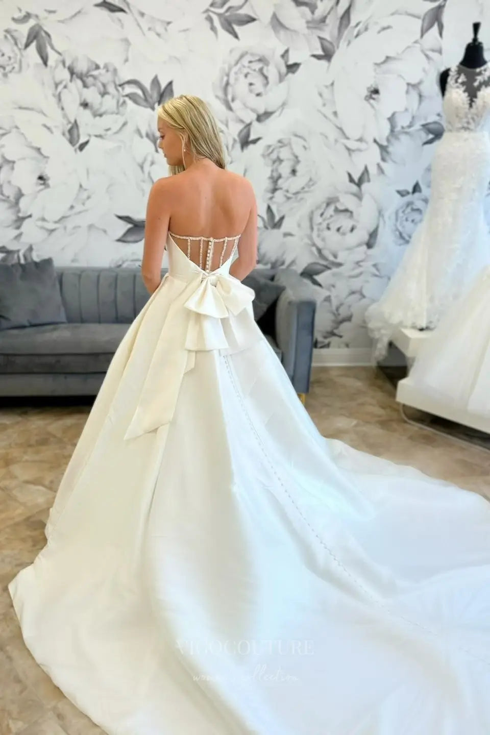 Timeless Strapless Satin Ball Gown Wedding Dress with Pearl-Trimmed Illusion Back, Pockets & Oversized Bow Train – W2611