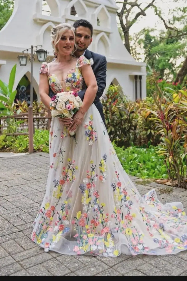 Whimsical Floral Embroidered Wedding Dress with V-Neckline, Sheer Bodice, and Chapel Train – W2231