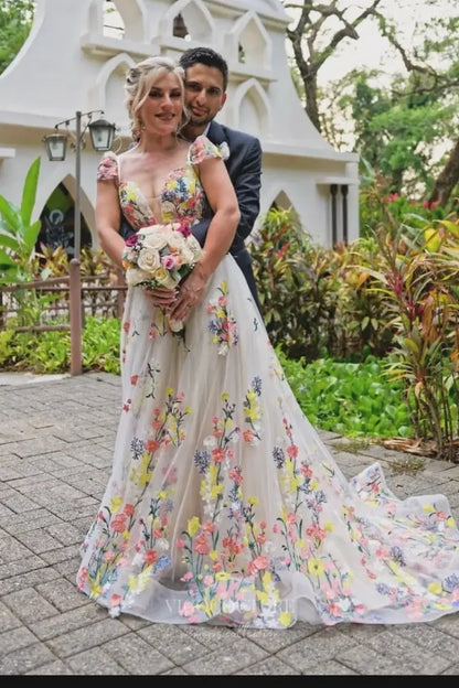Whimsical Floral Embroidered Wedding Dress with V-Neckline, Sheer Bodice, and Chapel Train – W2231