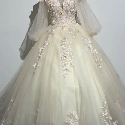Vestidos de quinceañera de manga larga color champán con apliques de encaje 20466