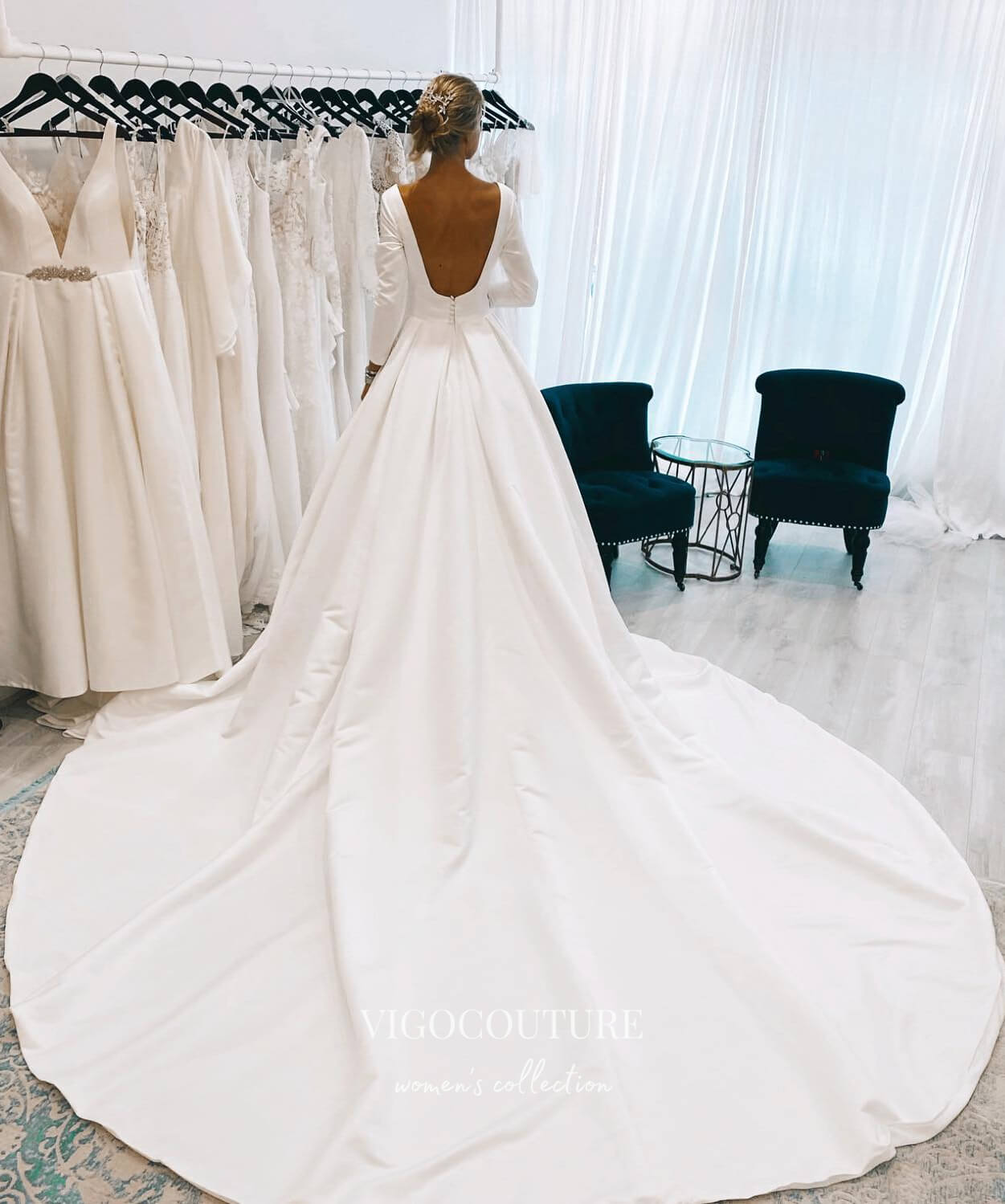 https://vigocouture.com/cdn/shop/products/long-sleeve-satin-wedding-dresses-cathedral-train-bridal-dresses-w0078-wedding-dresses-vigocouture-2.jpg?v=1669505545